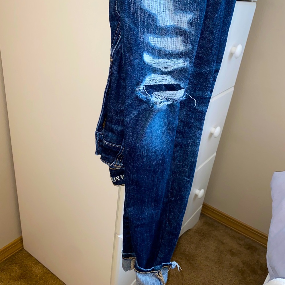 fake ripped blue jeans